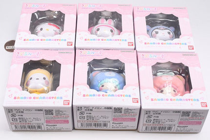 Six boxed Sanrio character capsule toys with clear window packaging