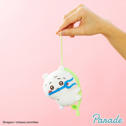 Hand-held plush mascot keychain, white character with blue band and green strap