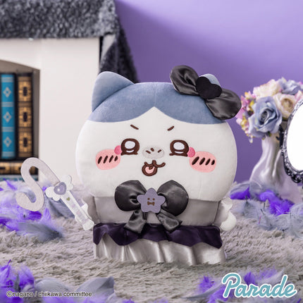 Panda-like plush toy with light blue hood, black bow, and purple ruffle skirt