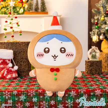 Gingerbread-style Chiikawa Christmas plush toy with brown hood, blue face, red bow, green buttons