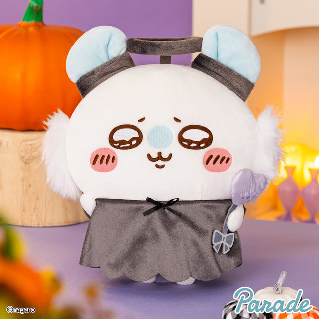 Big plush toy panda in gray dress with blue ear pads, front view