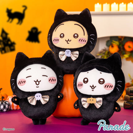 Set of three black cat plush toys with bow ties and round faces