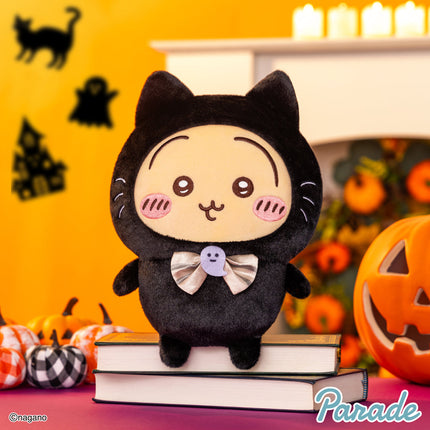 Black cat plush toy front view with white bow tie and whisker marks