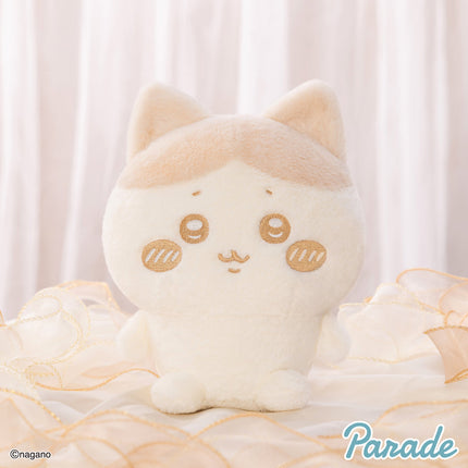 Milk-color cat plush toy with pointed ears and round embroidered snack-like motifs