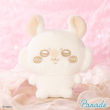 Cream plush rabbit character, front view with stitched eyes, nose, and long ears.