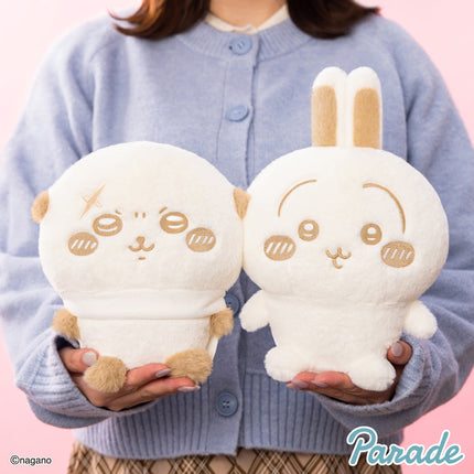 Cream plush rabbit pair, front view with stitched faces, beige feet details, long ears.