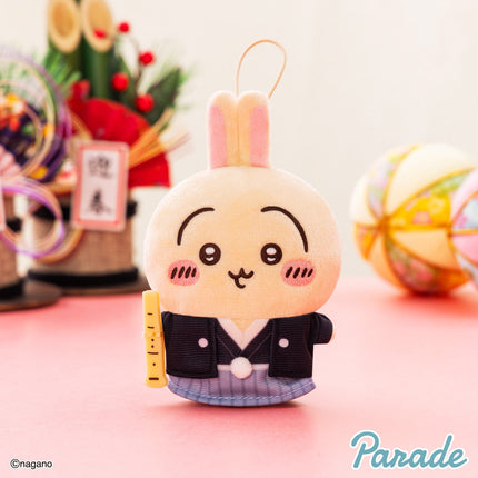 New Year mascot plush character with pink bunny ears, black jacket and blue skirt