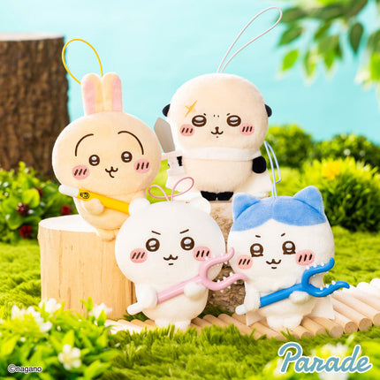 Set of small cream plush mascot keychains with colored faces and toy accessories