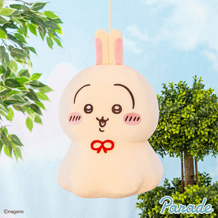 Cream bunny plush toy with long pink ears, smiling face and red bow, XL size