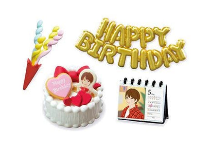 a birthday cake, a balloon that says "Happy Birthday", a calendar, and a small figurine of a person.