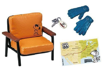 a Peanuts themed chair, a set of blue gloves, a keychain, and a map of Route 66.