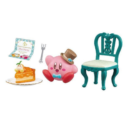 A pink toy character wearing a top hat and bowtie is sitting next to a slice of cake on a plate, with a fork and a green chair nearby.