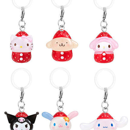 Six strawberry character keychain charms with metal rings, arranged on white background