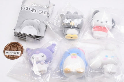 Five flocky plush capsule doll figures sealed in clear individual bags