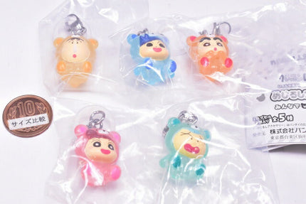 Set of 5 chibi pajama character keychain accessories, shown in sealed clear bag