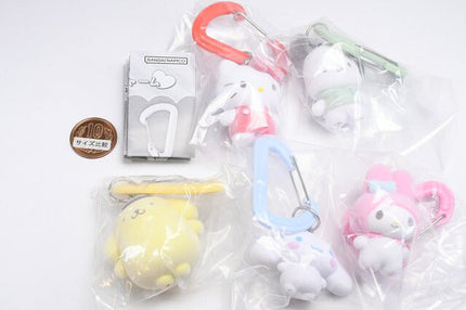 Five Sanrio character carabiner mascot charms in clear plastic bag packaging