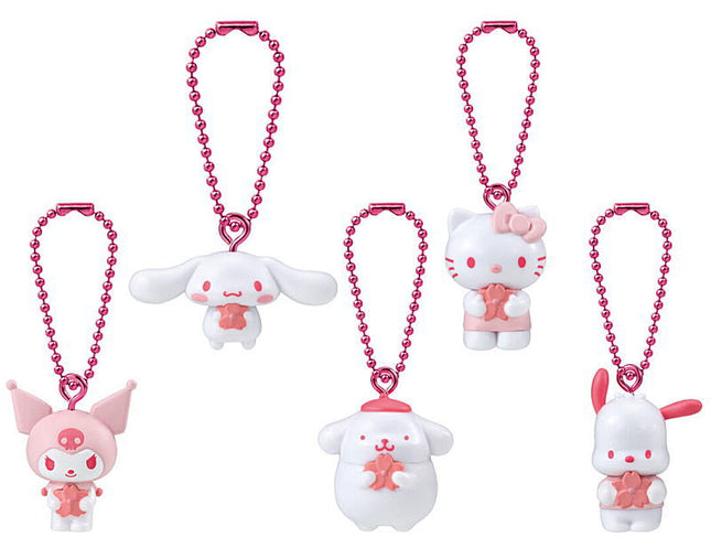 Five hanging pink-bead mascot keychains with white-and-pink bunny figures