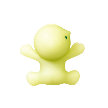 A yellow, round, and green toy figure with outstretched arms.