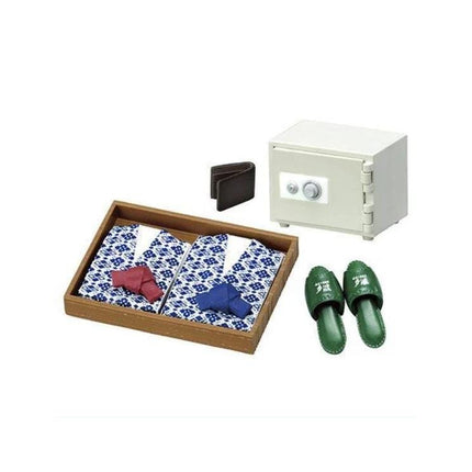 a safe, a wallet, a pair of slippers, and a box of ties.