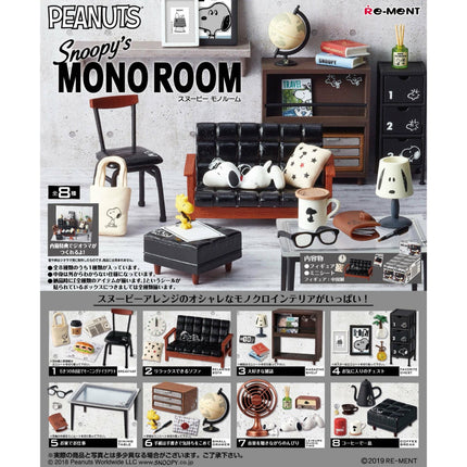 The image is a collection of various Peanuts-themed miniature furniture and accessories, including a sofa, chair, bookshelf, lamp, and other decorative items. The items are arranged in a room setting, creating a cozy and nostalgic atmosphere reminiscent of the Peanuts comic strip.