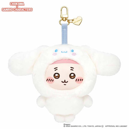 A plush toy of a white bunny character wearing a bunny costume with a heart-shaped tag attached to it.