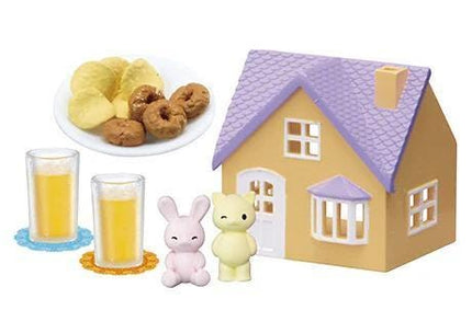a toy house, two cups of beer, a plate of donuts, and two small animal figurines.