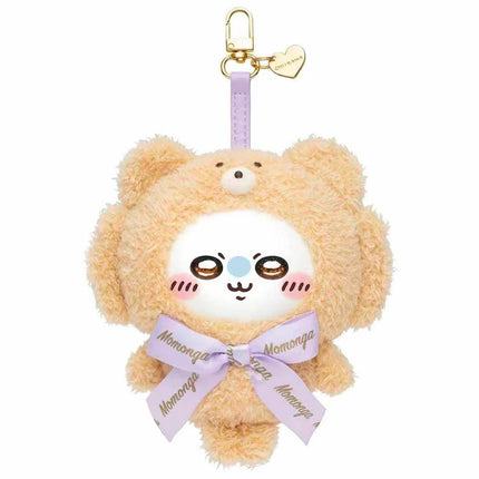 A plush toy of a bear wearing a bow tie and a heart-shaped tag.