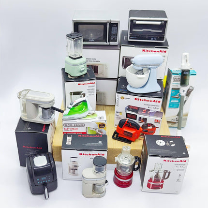 a variety of kitchen appliances and electronics, including a microwave, toaster oven, blender, and other small appliances, all neatly arranged on a white background.