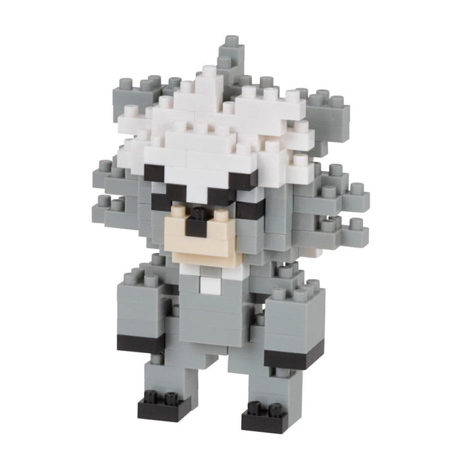 A gray and white pixelated toy figure made up of numerous small blocks.
