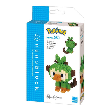 a Pokemon-themed packaging for a Nanoblock set. The packaging includes a box with a blue and white color scheme, and it features a picture of a green pixelated character resembling a Pokémon.