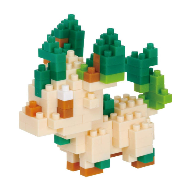 A colorful, geometric toy made of small, interlocking plastic blocks in various shades of green, orange, and white.