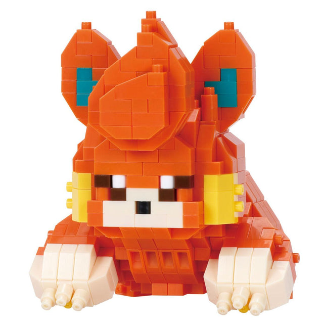 A colorful, pixelated toy resembling a character from a video game, made up of small orange and yellow blocks.