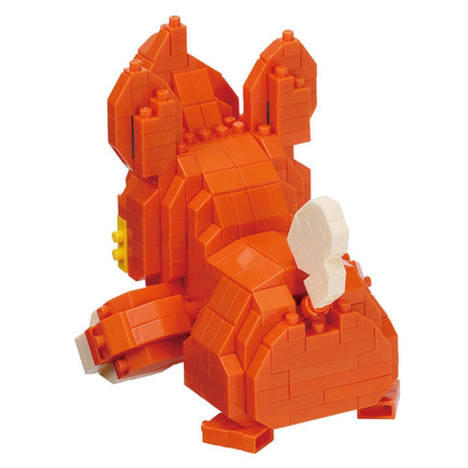 a toy made of orange and white building blocks, resembling a small animal or object.