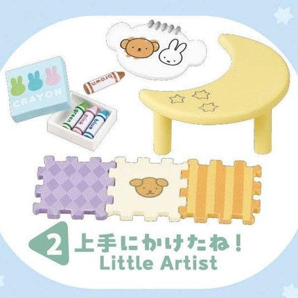 The image is a collage of various toys and objects, including a crescent moon, crayons, a dog, and a small table.