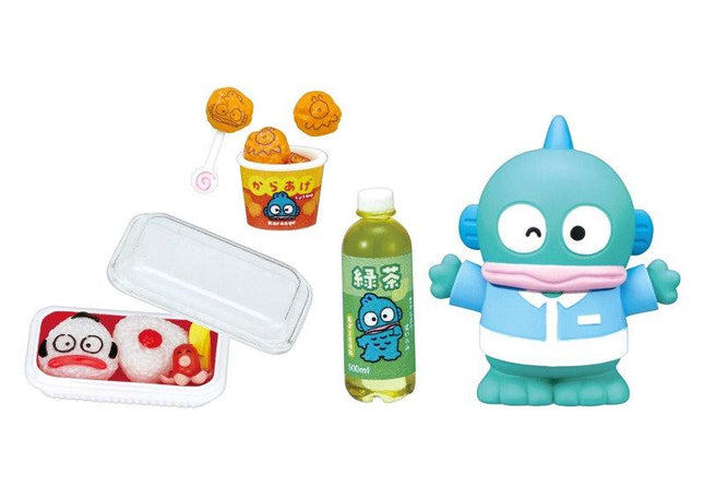 various colorful toys and food items, including a blue toy fish, a toy cup, a toy noodle, a toy soda bottle, and a toy container with a red and white clown face.