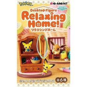 The image is a promotional poster for a "Designed for the Ultimate Collector" desktop figurine set, featuring various Pokemon characters in a whimsical, colorful setting.