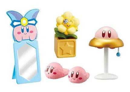 a collection of five small, colorful figurines or toys, including a pink character with a flower, a pink character with a bow, a pink character with a bow, a pink character with a bow, and a pink character with a bow.