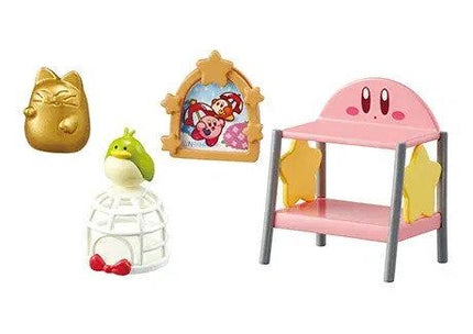 a variety of colorful and whimsical toys, including a gold cat figurine, a pink bunk bed, a white bird figurine, and a pink star-shaped chair.