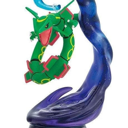 A figurine of a green dragon-like creature with a blue and purple swirl-like design, standing on a base with the text "No.34b Rayquan" on it.