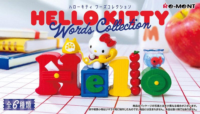 The image is a promotional poster for the Hello Kitty Words Collection, featuring a Hello Kitty figurine and various colorful objects arranged to spell out the word "Hello".