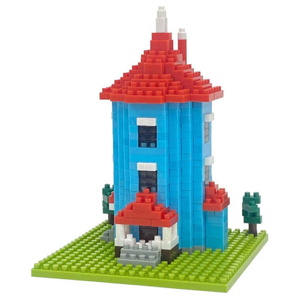 A colorful, two-story building made of small, interlocking plastic bricks in various shades of blue, red, and white.