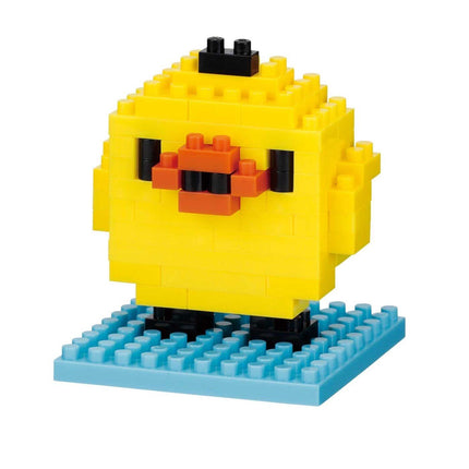 A yellow, pixelated bird-like figure made of building blocks, standing on a blue base.