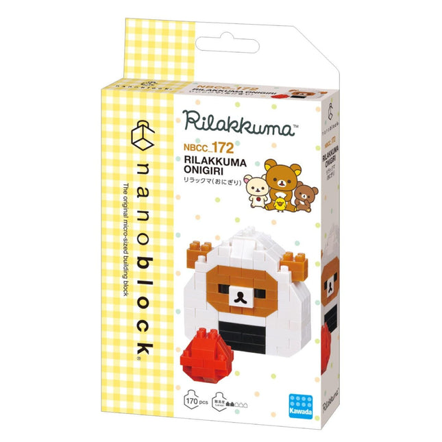 a packaging box for a product called the "Rilakkuma" which is a type of building block. The box is yellow and white, and it has a cartoon image of a bear and a sheep on it. The product is described as a "Nano Block" and is designed to be used with a "Nano-scale building block" to create various shapes and structures.