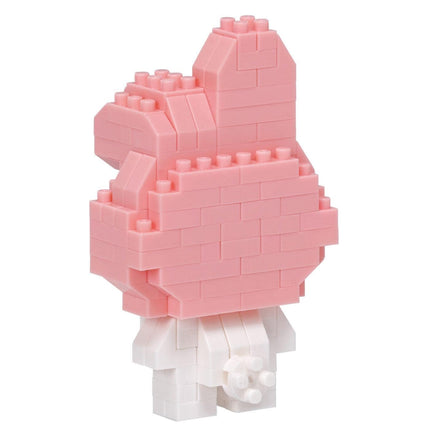A pink and white 3D building block figure is shown against a white background.