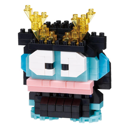 A colorful and whimsical toy made of various building blocks, including a blue and black body, yellow horns, and a pink mouth.