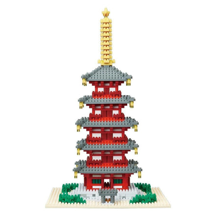 A multi-tiered pagoda-like structure made of small red and gray building blocks, with a golden spire at the top.