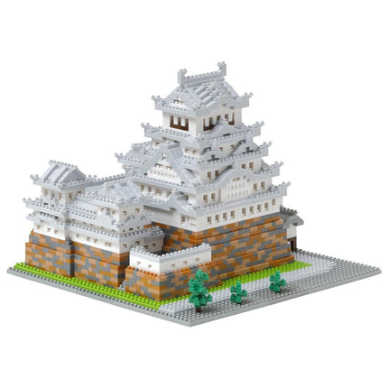 A 3D model of a Japanese castle-like structure made of small, colorful building blocks.