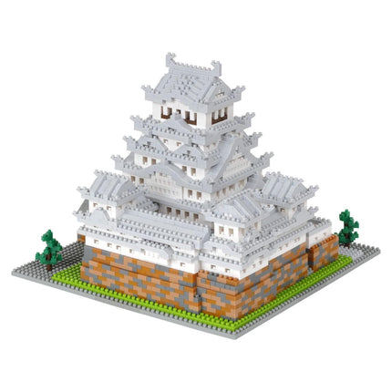 A 3D model of a Japanese castle-like structure made of small, colorful building blocks.
