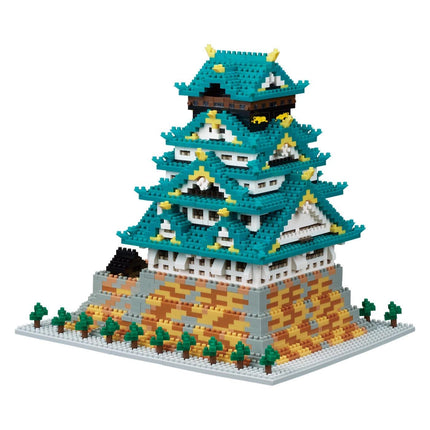 A colorful, intricate model of a Japanese castle-like structure made of small, colorful building blocks.