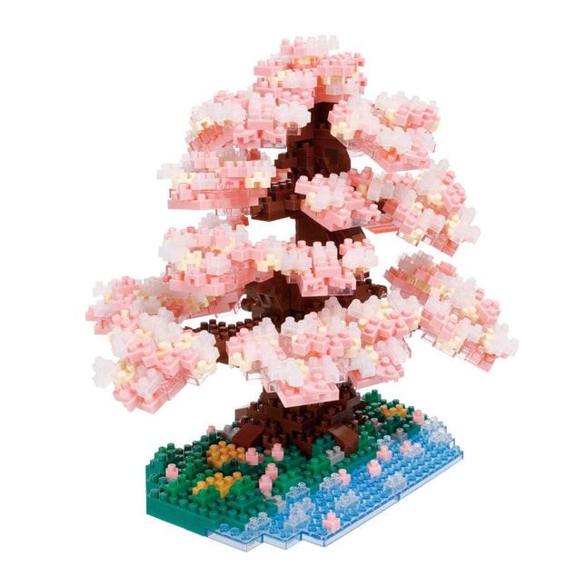 A 3D model of a pink cherry blossom tree made of small, colorful building blocks.